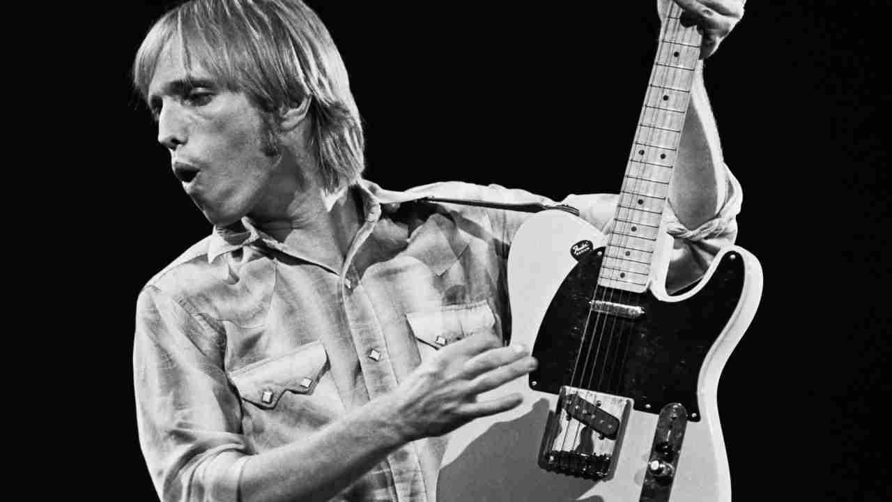Tom Petty performing onstage in 1981