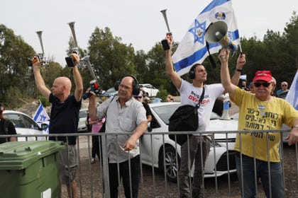 Protesters in front of the Kishon Detention Facility calling for the release of anti-government activist Yolanda Yavor on Saturday. Credit: Yair Gil Protesters in front of the Kishon Detention Facility calling for the release of anti-government activist Yolanda Yavor on Saturday.
