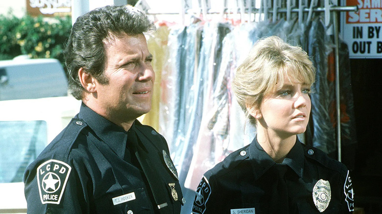 Sgt. T.J. Hooker (William Shatner) and Officer Stacy (Heather Locklear) work a case on T.J. Hooker