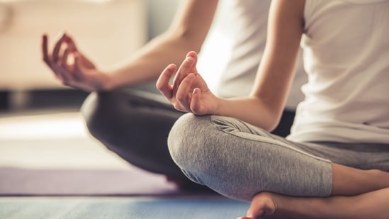 Breathe, stretch, and balance better with these yoga essentials. (Adobe )