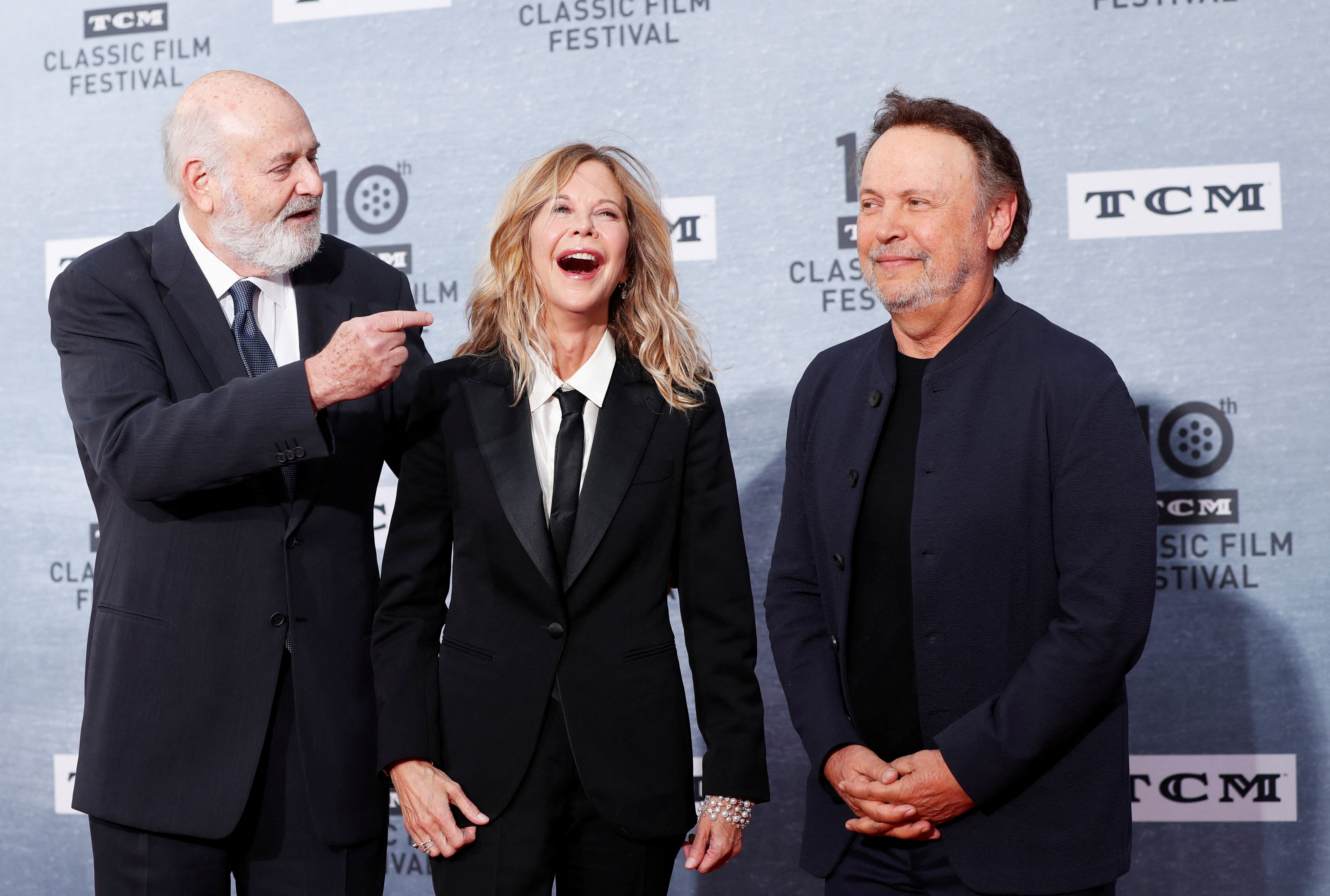 Director Rob Reiner, Meg Ryan, and Billy Crystal react at the "When Harry Met Sally" 30th anniversary screening.