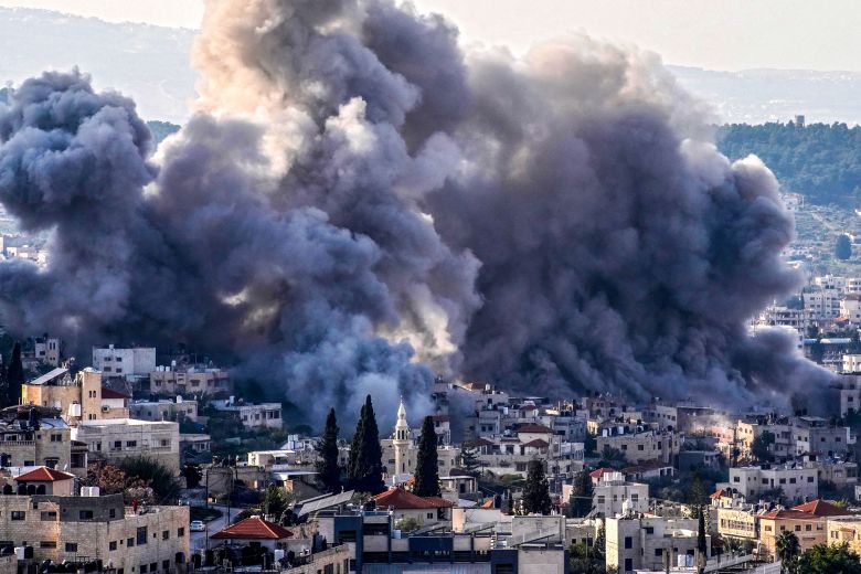 Smoke billows from the site of several explosions during an Israeli raid on the Jenin camp in the West Bank on February 2.
