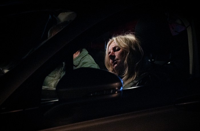 Lisa is unconscious in a darkened car in a scene from Corriedale