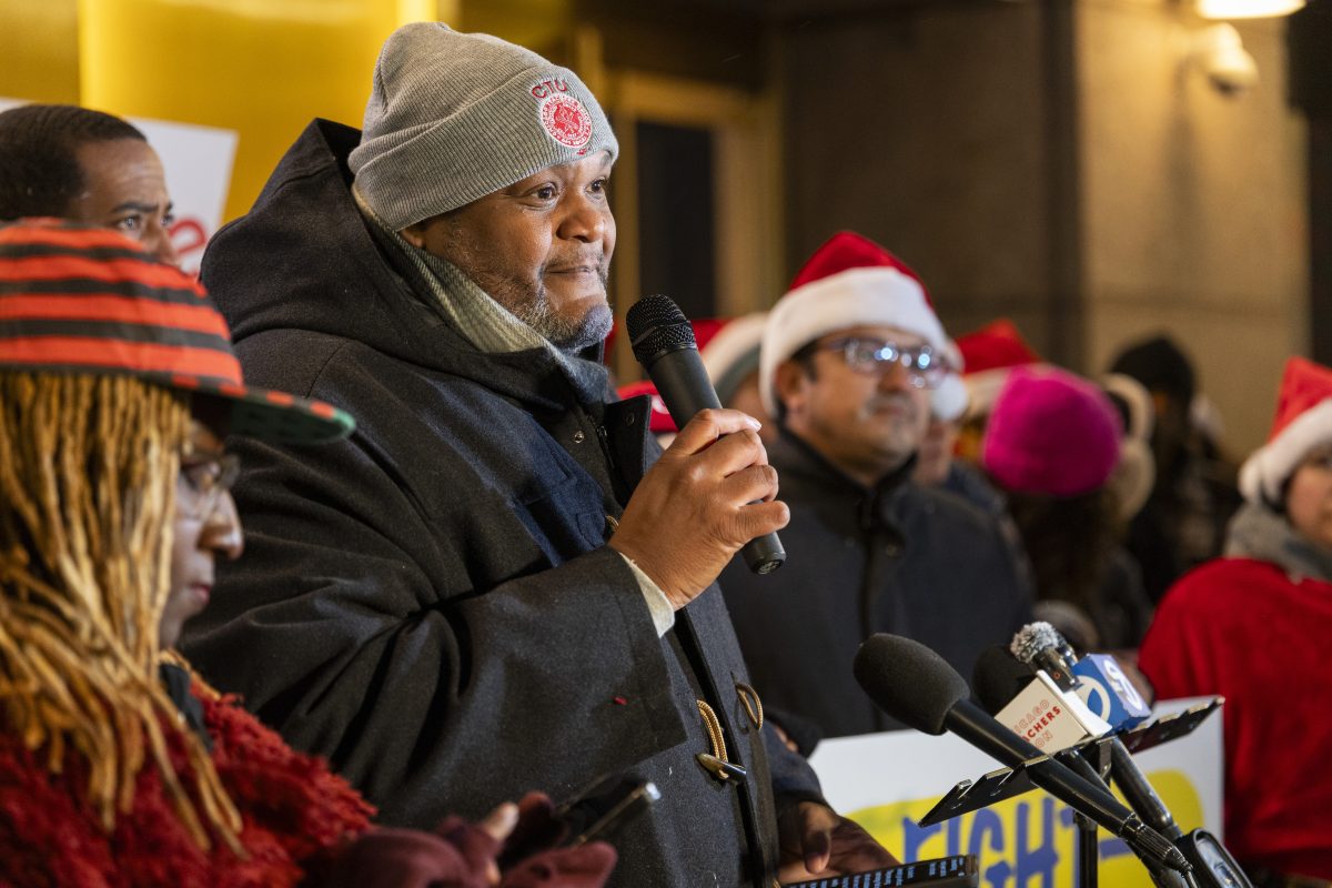 CTU Member Larnce White speaks at the Tax the Rich Holiday rally, calling the City Council to pass the Protecting Chicago Budget. CTU Member Larnce White speaks at the Tax the Rich Holiday rally, calling the City Council to pass the Protecting Chicago Budget.