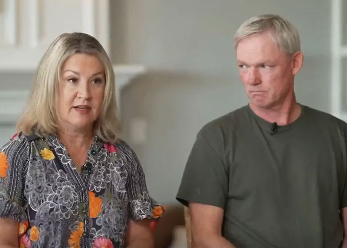 Two adults seated indoors, discussing concerns related to ChatGPT and expert criticism after teenager tragedy.