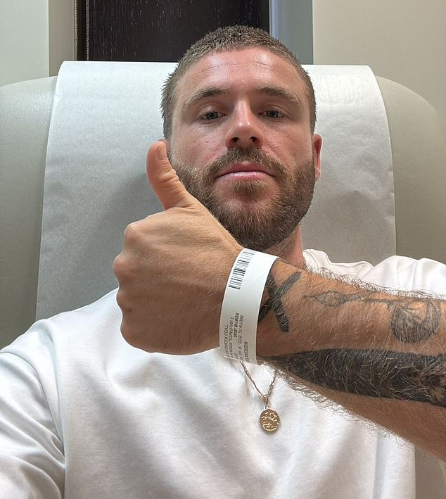 Pictured: A post-surgery thumbs up. The moment I woke from the operation, my years-long back pain was gone. It never returned