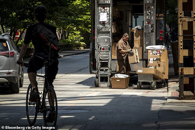 The fee on delivered packages may be included in the financially-suffering city's 2026 budget (file photo: A UPS delivery in Chicago)
