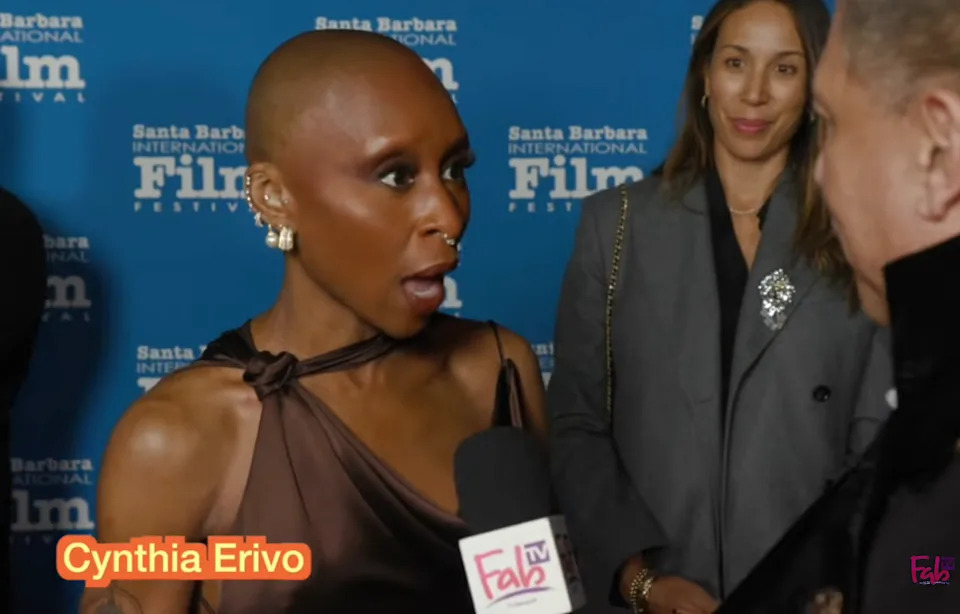Cynthia being interviewed on a red carpet