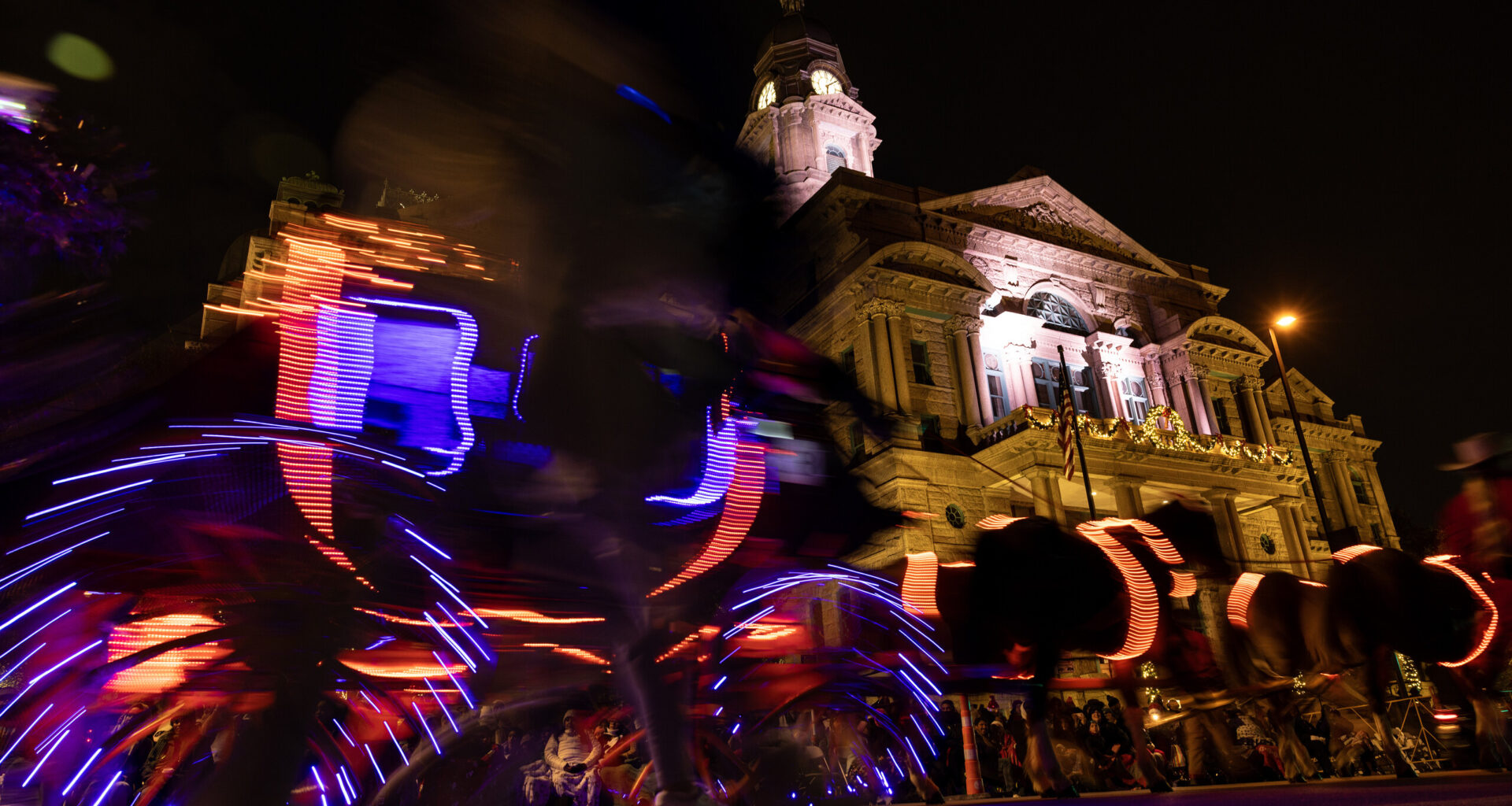 Fort Worth families brave cold as twinkling parade warms up downtown scene