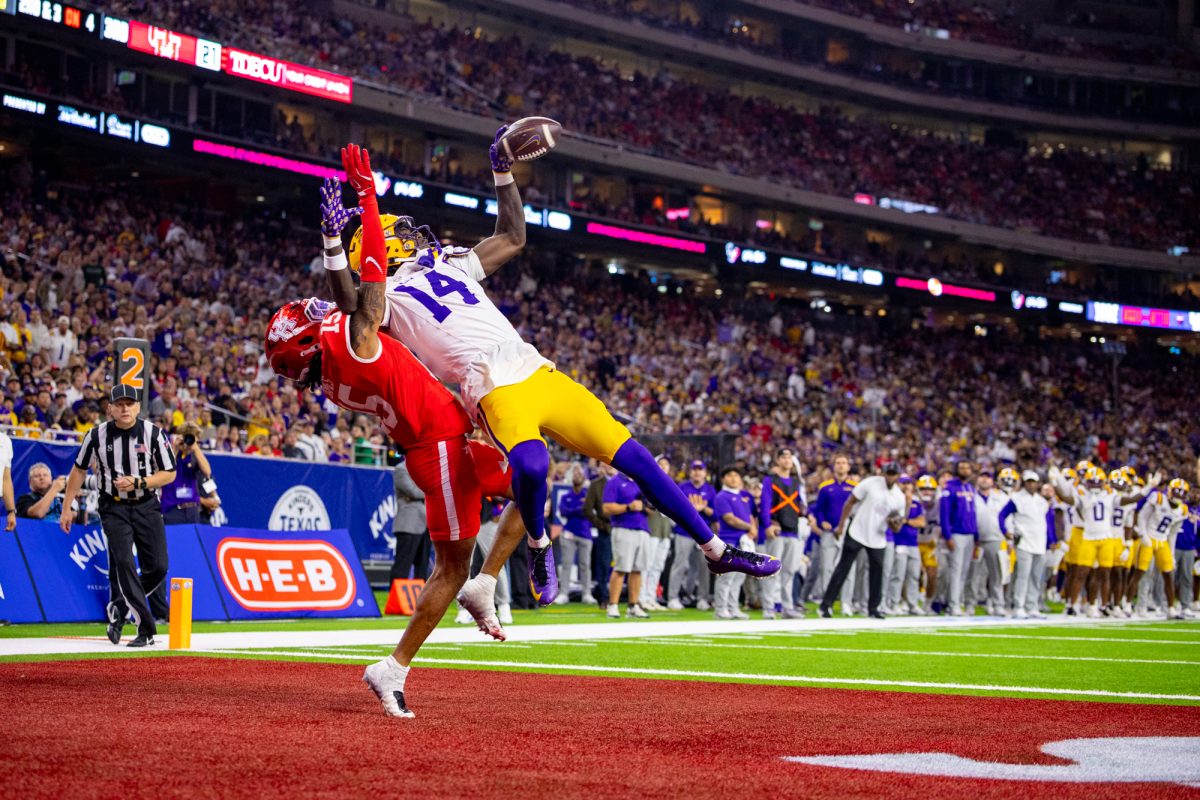 LSU football sophomore tight end Trey’Dez Green (14) catches the ball for a touchdown during LSU’s 38-35 loss against the University of Houston on Saturday, Dec. 27, 2025, at NRG Stadium in Houston, Tx.