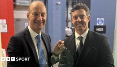 Stephen Watson presents the BBC NI Sports Personality of the Year award to Rory McIlroy