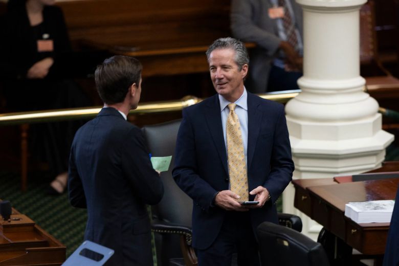 State Sen. Kelly Hancock, R-North Richland Hills, speaks with Sen. Mayes Middleton on March 25, 2025. Hancock, now the state comptroller, announced major changes to the state's Historically Underutilized Business program on Tuesday. Lorianne Willett/The Texas Tribune
