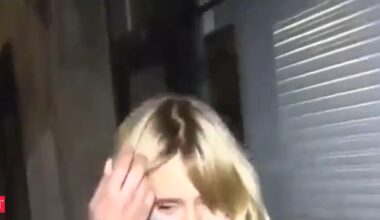 Putin’s alleged daughter says she’s ‘really sorry’ for the Ukraine war before being escorted away by a bodyguard—watch video