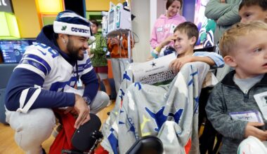 Cowboys players, cheerleaders make holiday visit to Children’s Medical Center Dallas