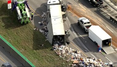 18-wheeler overturns, spills trash along I-20 in Dallas
