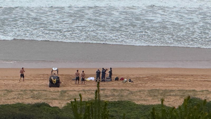 Man dead after boat flips off Sydney’s northern beaches, teen feared missing