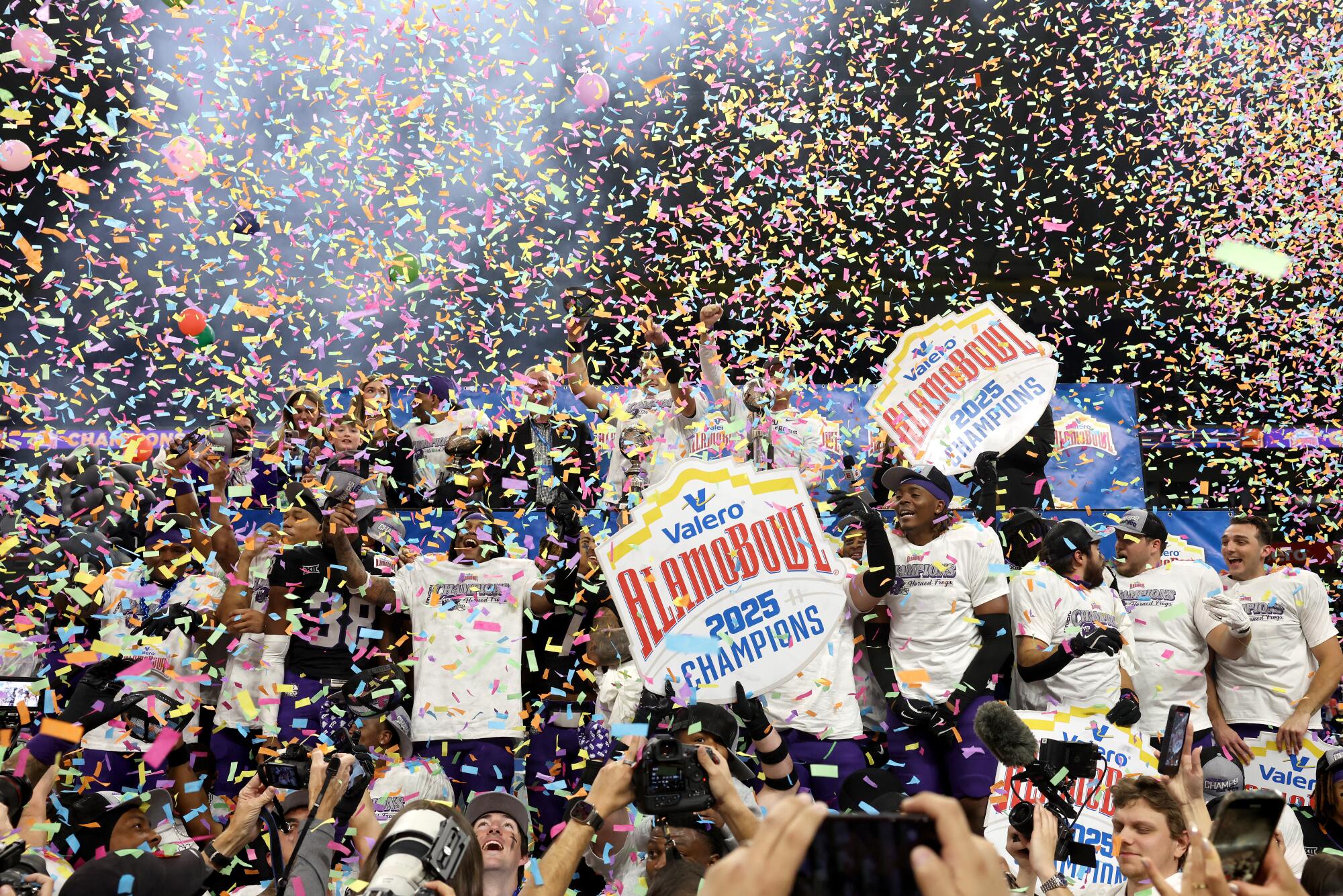 TCU players celebrate after beating USC in the Alamo Bowl on Tuesday night.