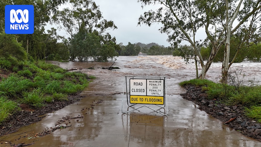 Flooding claims a life as deluge cuts north-west Queensland roads, isolates towns