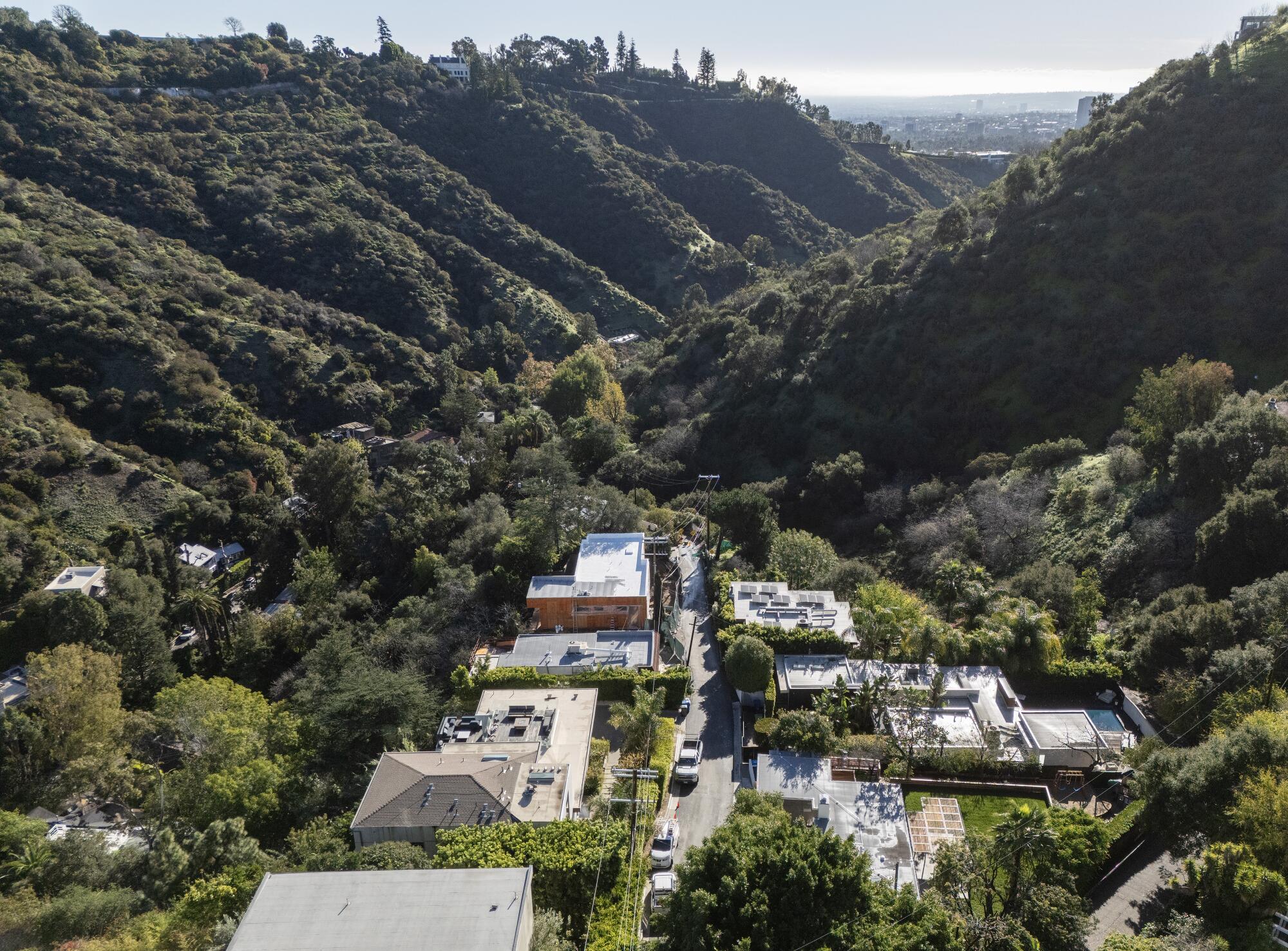 Aerial view of a single-family home under construction on Sandal Lane, center left, in Los Angeles