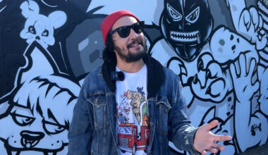 Local muralist designs t-shirt to help children fulfill their holiday wishes