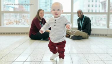 Miracle baby treated with pioneering CRISPR gene-editing therapy at CHOP takes first steps