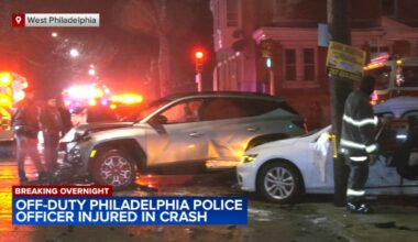 Philadelphia police officer injured in crash on way to work