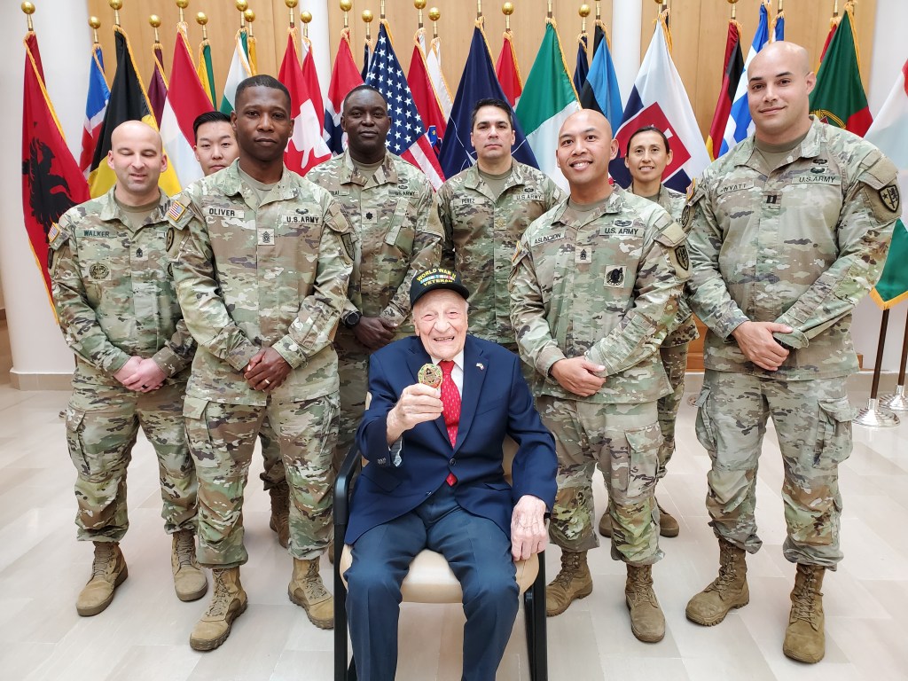 Dominick Critelli, the 104-year-old who will play the national anthem on the saxophone on Saturday Dec. 27. 