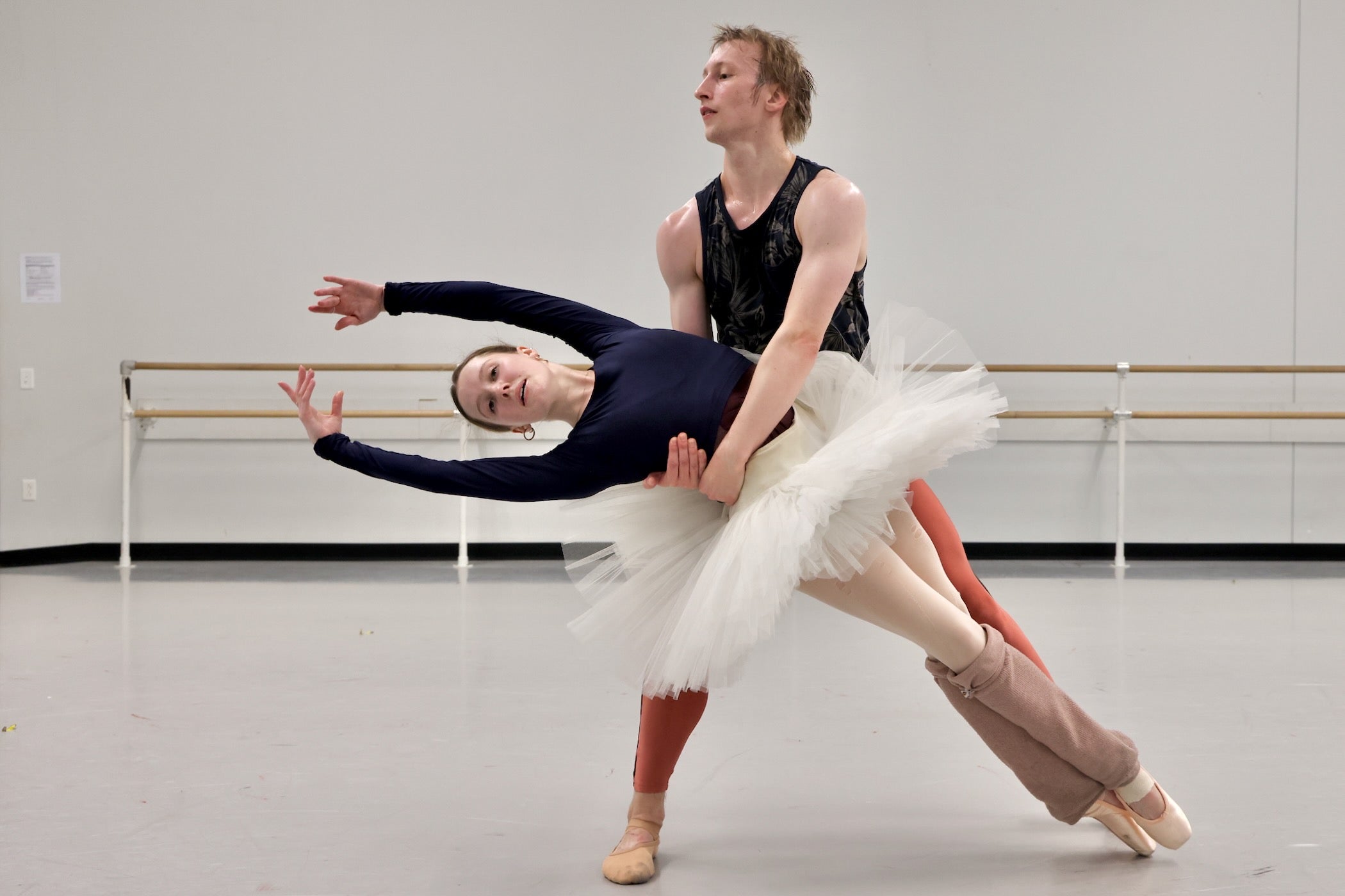 Two ballet dancers rehearsing in the dance studio