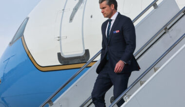 U.S. President Donald Trump participates a dignified transfer of the remains of two Iowa National Guard members, in Dover