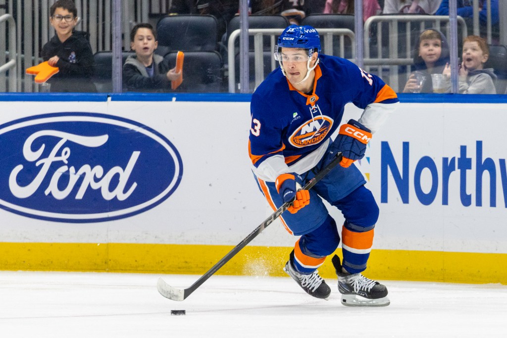 New York Islanders center Mathew Barzal (13) skates up ice during the first period against the Washington Capitals at UBS Arena, Sunday, Nov. 30, 2025, in Elmont, NY. 