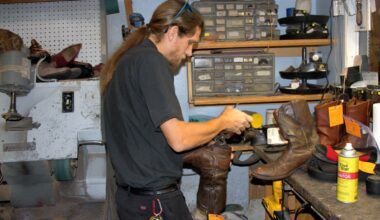 Lee Vaccaro puts a new heel on a cowboy boot at Gus and Company as his great-grandfather did in 1904.