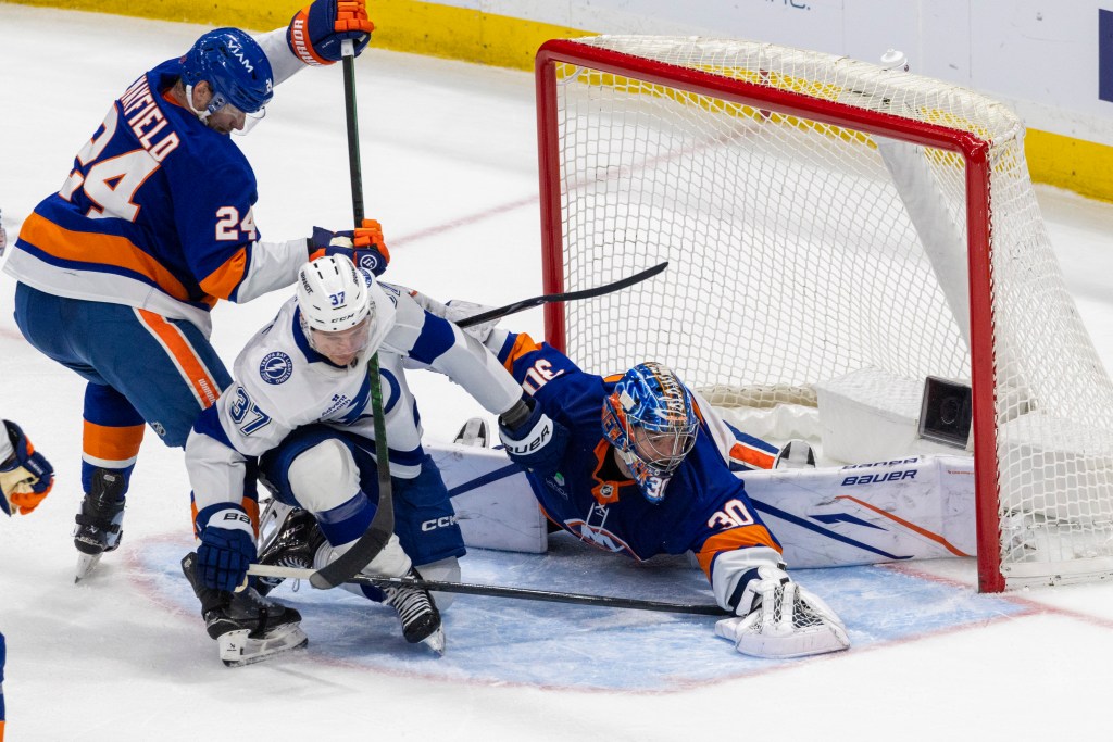 New York Islanders goaltender Ilya Sorokin (30) makes a save during the third period at UBS Arena, Saturday, Dec. 13, 2025, in Elmont, NY. 