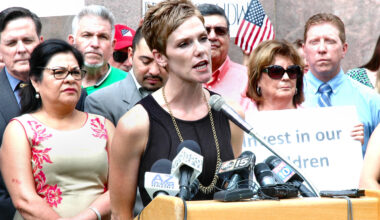 Julie Erfle in 2016 talking about efforts to expand a state law that allows candidates to get public funding if they avoid special interest money. She filed suit in October to prevent the city of Phoenix from selling off a gun that was used in 2007 to kill her husband, Nick, during an attempted arrest.