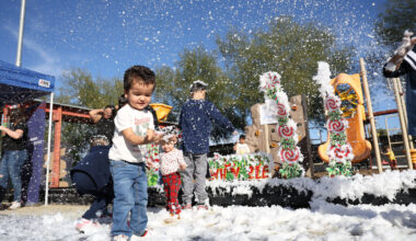 Children got to play in the snow at one of the Chicano Por La Causa