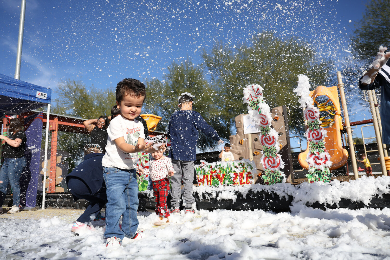 Children got to play in the snow at one of the Chicano Por La Causa