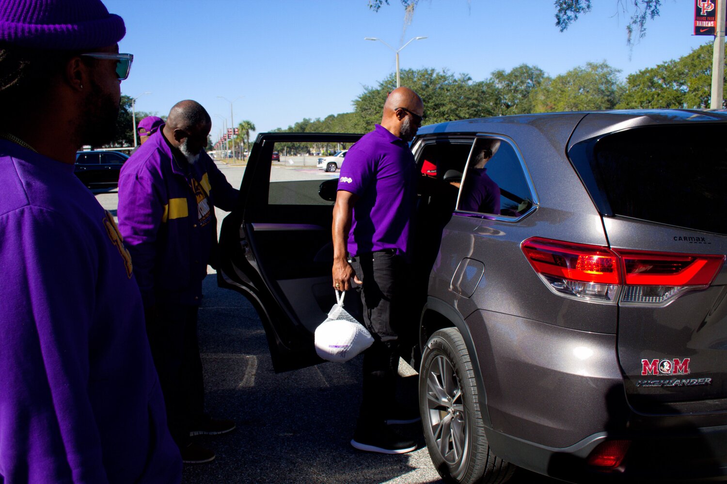 Omega Psi Phi, CPS provide 45 Christmas baskets to families