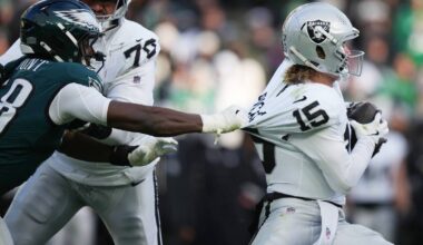 Philadelphia Eagles linebacker Jalyx Hunt (58) grabs Las Vegas Raiders quarterback Kenny Picket ...