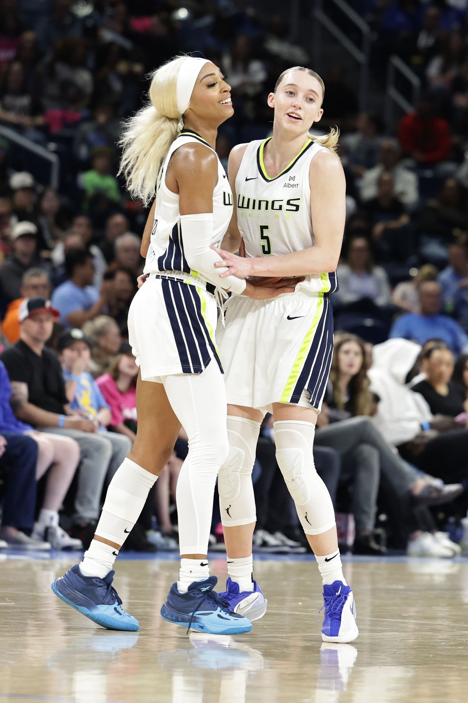 DiJonai Carrington and Paige Bueckers in May 2025.