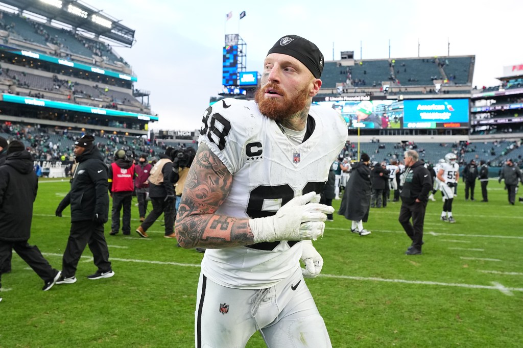 Maxx Crosby #98 of the Las Vegas Raiders runs off the field after the game against the Philadelphia Eagles at Lincoln Financial Field on December 14, 2025 in Philadelphia, Pennsylvania.