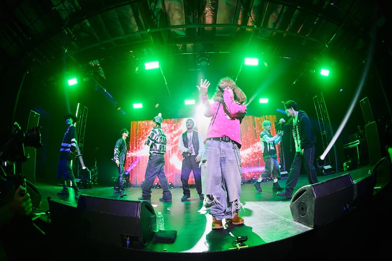 Artist perform with colorful lights