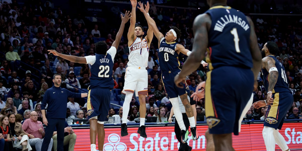 Booker leads Suns past Pelicans 123-114 after Alvarado and Williams exchange punches in testy game