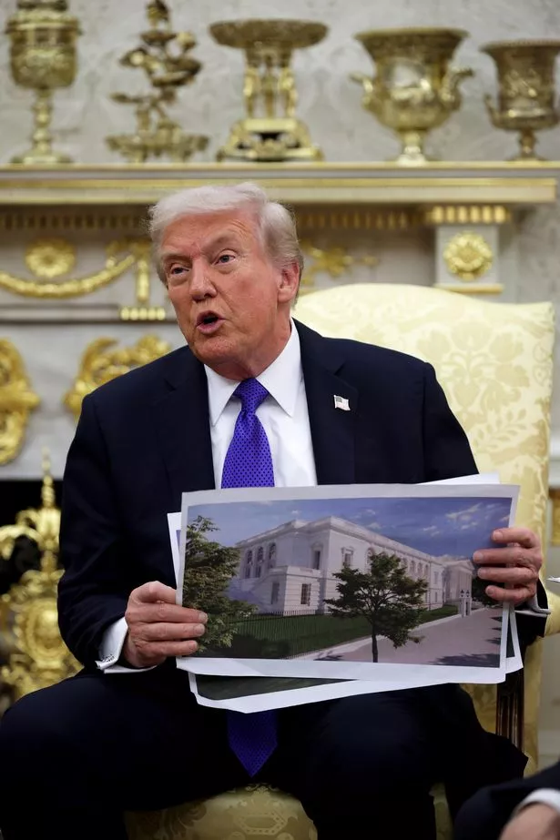 President Donald Trump displays a rendering of his proposed $250 million White House ballroom
