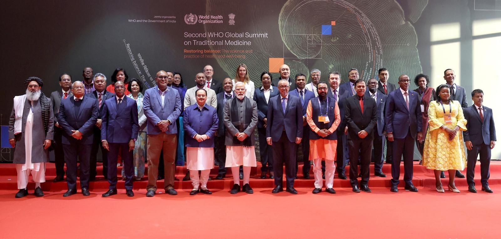 Group of Health Ministers, WHO Director-General, Dr Tedros and India's Prime Minister, Modi pose for a family photo at second WHO Global Summit on Traditional Medicine