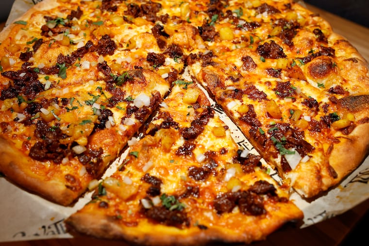 The al pastor pizza at Taco-Yote in Moorestown, New Jersey on Thursday, December 18, 2025.