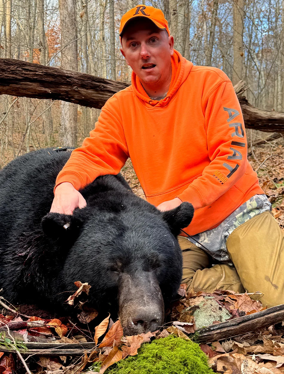 A hunter with a big Pennsylvania black bear.