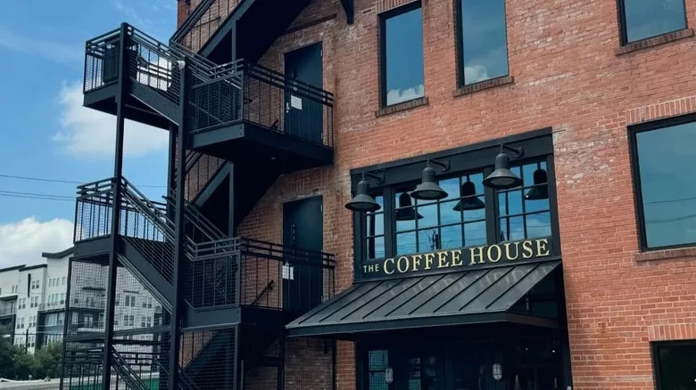 The facade of the red-bricked The Coffee House at West End captured on a sunny day.