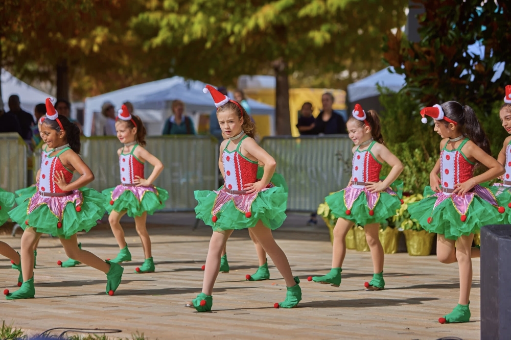 girls dressed in Christmas themed dance costumes