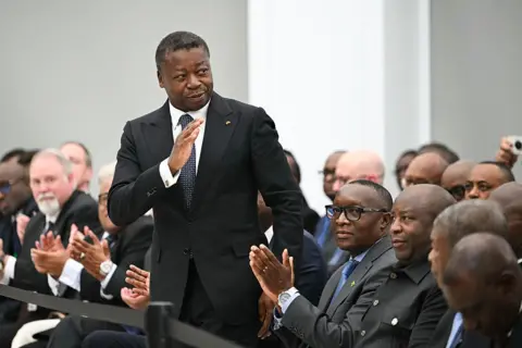 AFP Faure Gnassingbé applauded by other leaders in Washington in December.