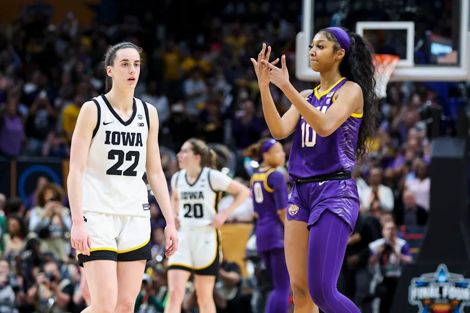 Former LSU Tigers forward Angel Reese (10) and former Iowa Hawkeyes guard Caitlin Clark (22) in the 2023 Women's NCAA Tournament title game.Kevin Jairaj-Imagn Images