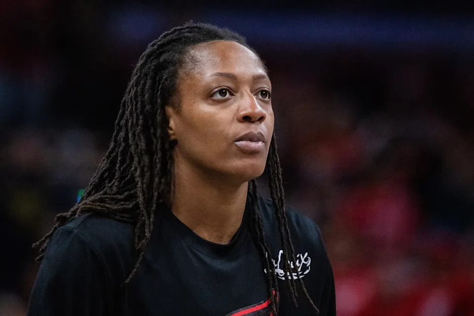 Indiana Fever guard Kelsey Mitchell looks on during Game 3 of the WNBA semifinals against the Las Vegas Aces.© Trevor Ruszkowski-Imagn Images